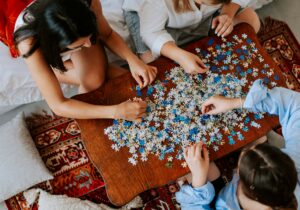 girls solving a puzzle